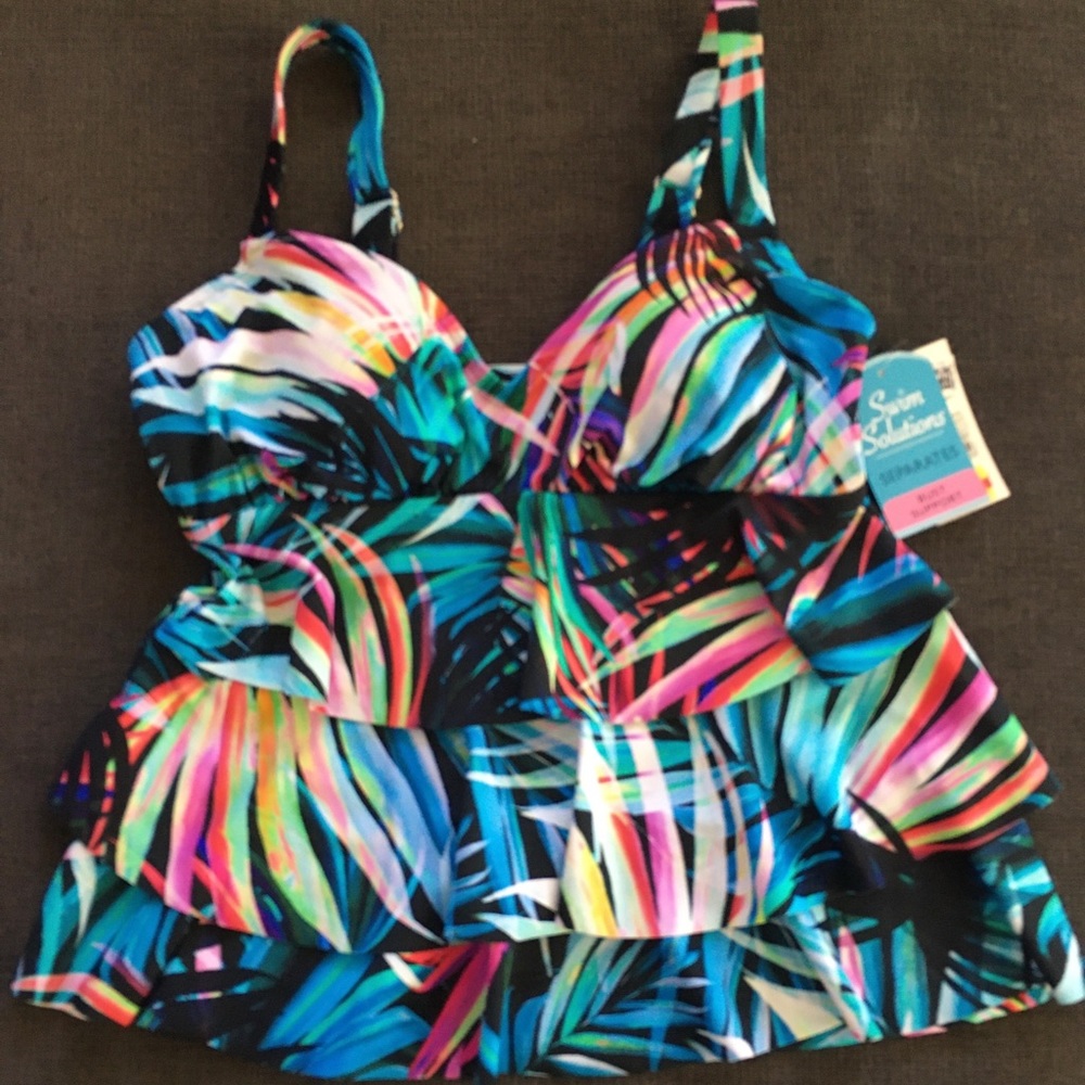 A brand new triple tier top never worn with tags